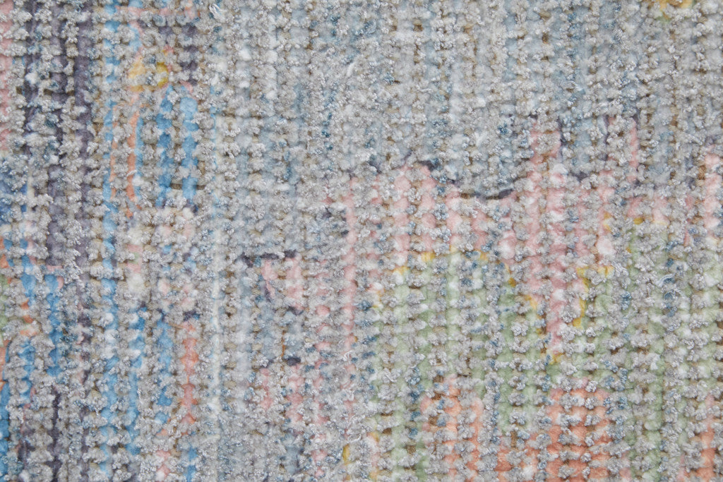 10' X 14' Orange Blue and Gold Floral Hand Woven Distressed Area Rug With Fringe