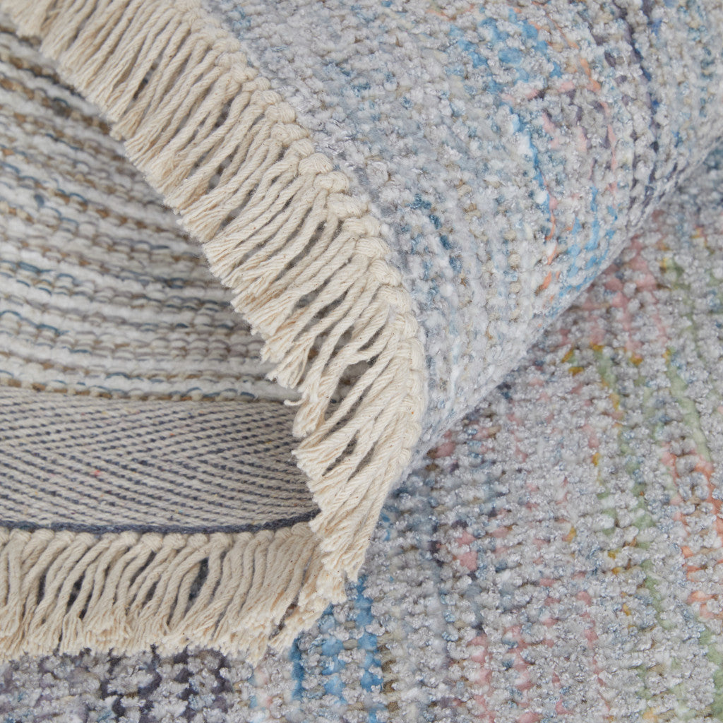 10' X 14' Orange Blue and Gold Floral Hand Woven Distressed Area Rug With Fringe